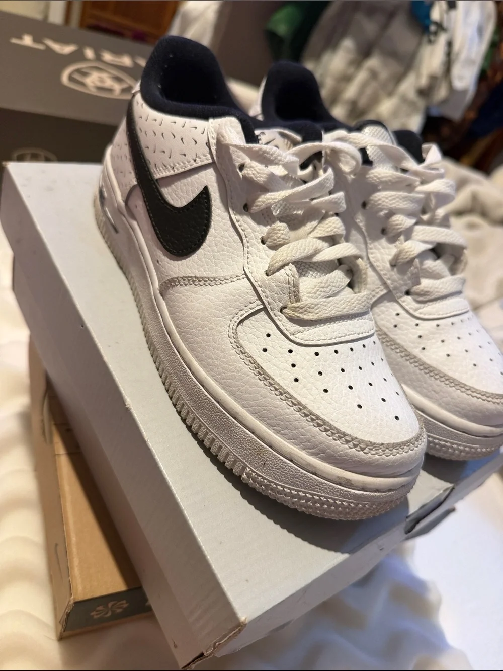 Nike White Low-Top Sneakers with Black Swoosh